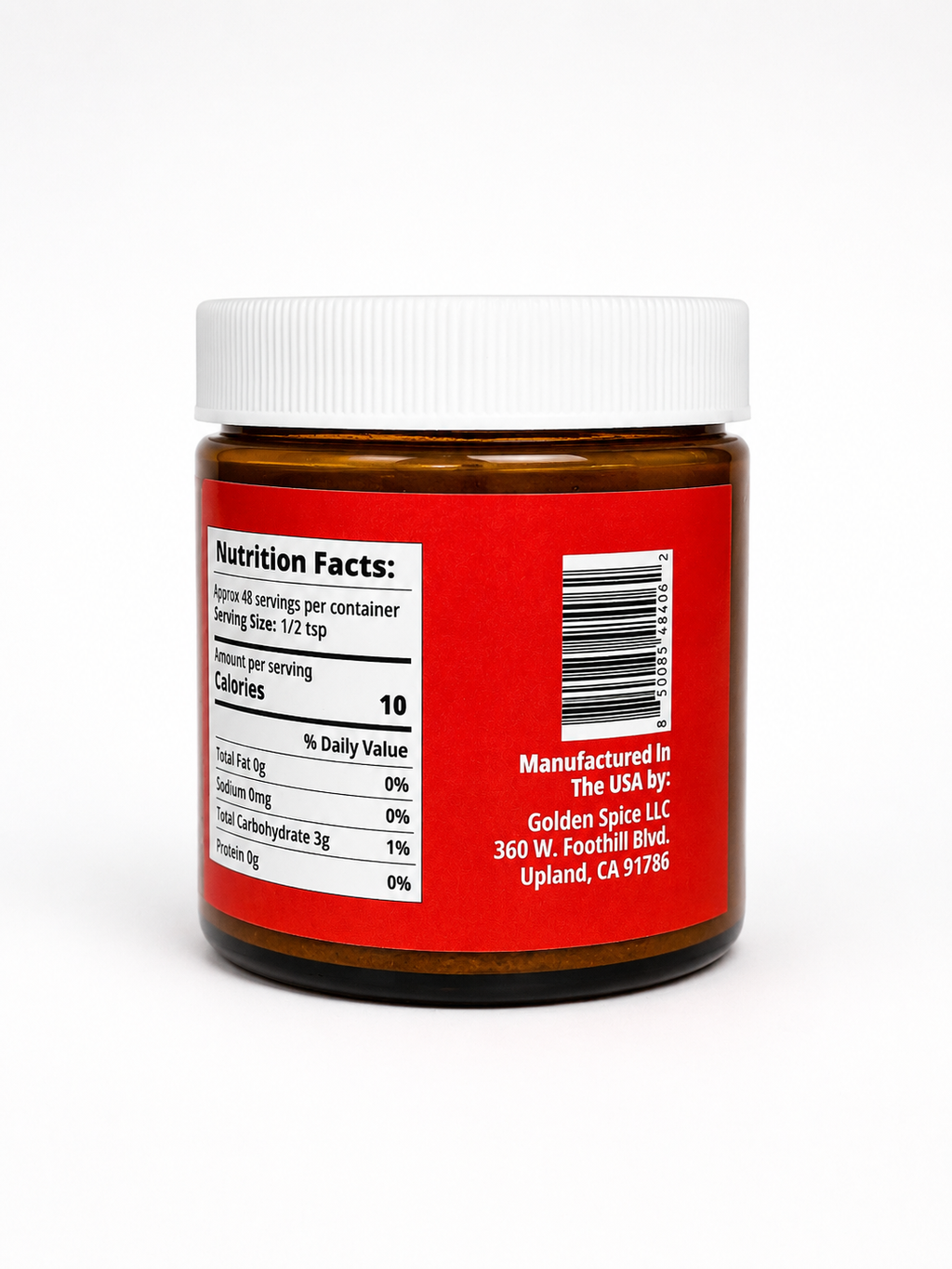 An amber glass jar with a white ribbed lid, showing the back of the label with a red background, nutrition facts, and manufacturing details. The product is photographed on a clean white background.