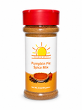 A clear plastic spice jar filled with pumpkin pie spice mix, featuring a white label with a yellow sun logo and orange text reading 'Golden Spice Pumpkin Pie Spice Mix,' topped with a red flip-top lid on a white background.